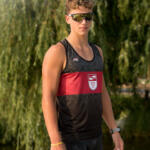 young man in tank top with red stripe